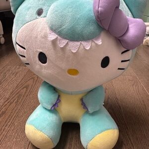 Hello Kitty In dinosaur costume plushie